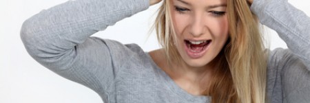 Stressed blond woman shouting